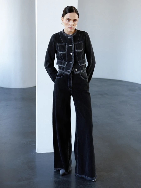 Black denim jacket in Chanel style